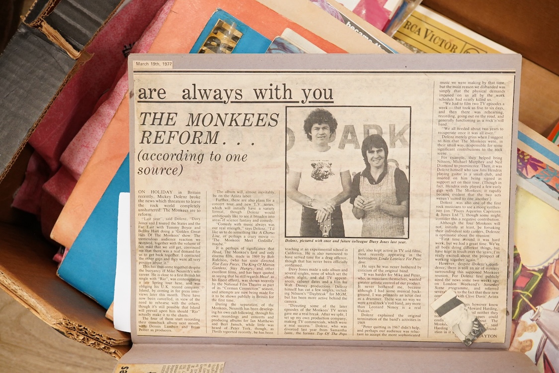 A collection of original 1960s pop memorabilia including The Beatles related items; a pair of Beatles curtains together with some spare material, a brooch on its original backing card, and a number of magazines, a 1979 W